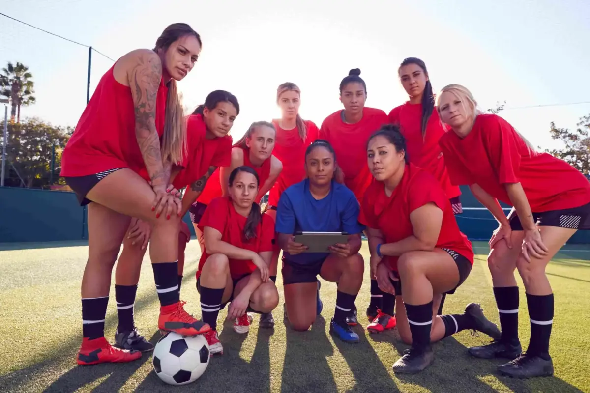 Women's soccer team gathered together before a game
